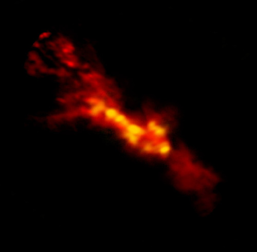 Imagen de nubes incubadoras de estrellas dentro de NGC 253 producidas por ALMA. Créditos: B. Saxton (NRAO/AUI/NSF); ALMA (NRAO/ESO/NAOJ), A. Leroy